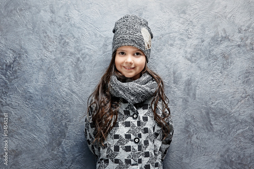 Cute little girl in warm cl...