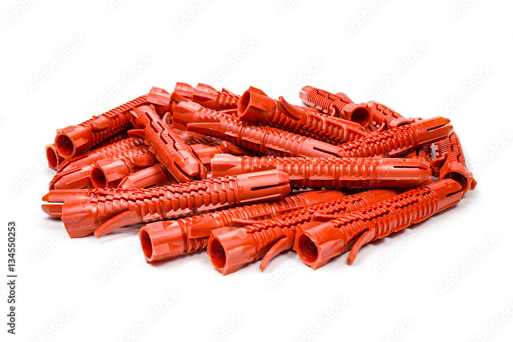 10 mm diameter red plastic anchors on a white background
