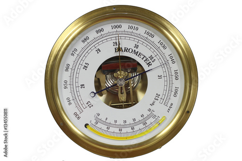 Old round barometer meter isolated over white background
