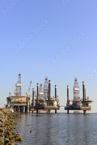 Oil drilling platform in the sea © hanmaomin