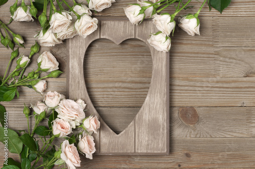 Fototapeta Naklejka Na Ścianę i Meble -  Wooden heart shape frame
