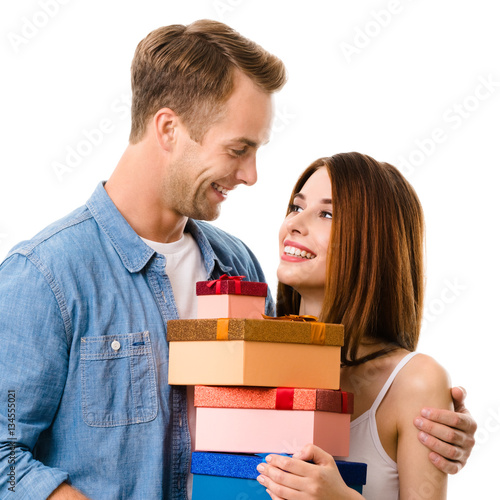 Happy couple with gift box, on white © vgstudio