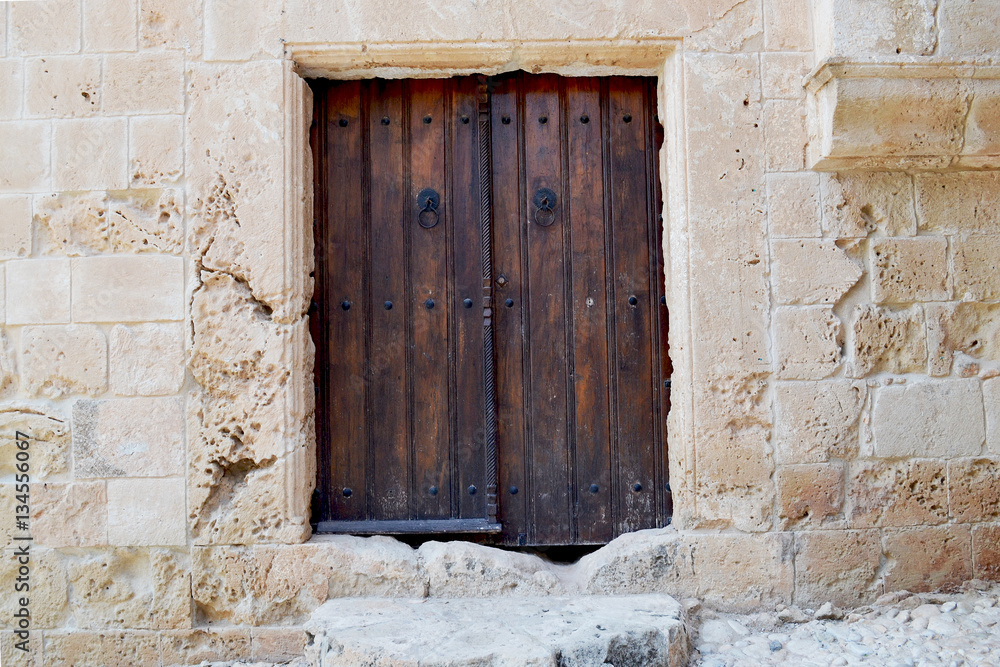Vintage wooden door - a fragment of an ancient monastery. Cyprus. Ayia Napa