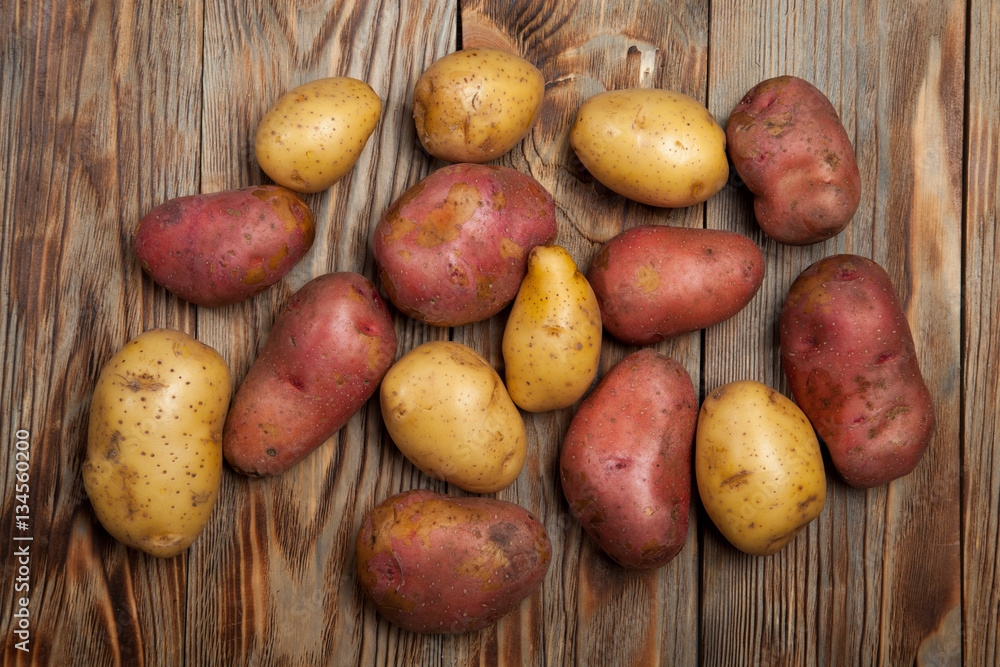 Potatoes on a rustic background Potatoes on a rustic background