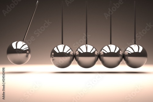 Fotografie Metal spheres bouncing in line
