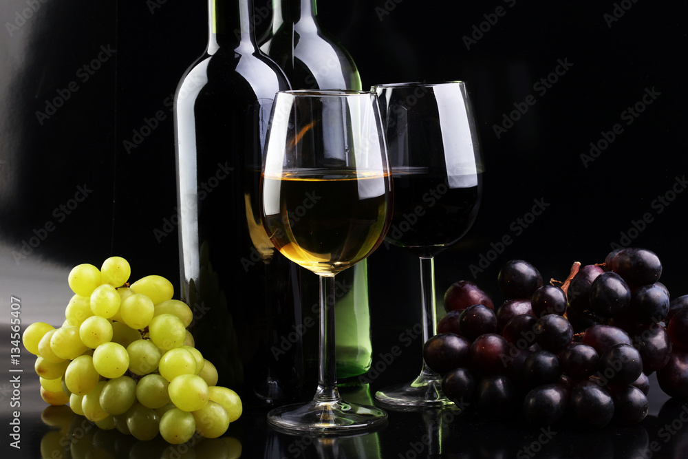 Wine glass and Bottle on black background. Red and white wine