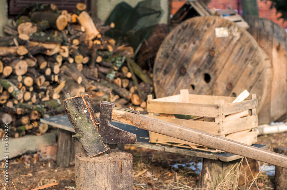 Strong lumberjack chopping wood, chips fly apart. ax, hatchet, Strong lumberjack chopping wood, chips fly apart. ax, hatchet,