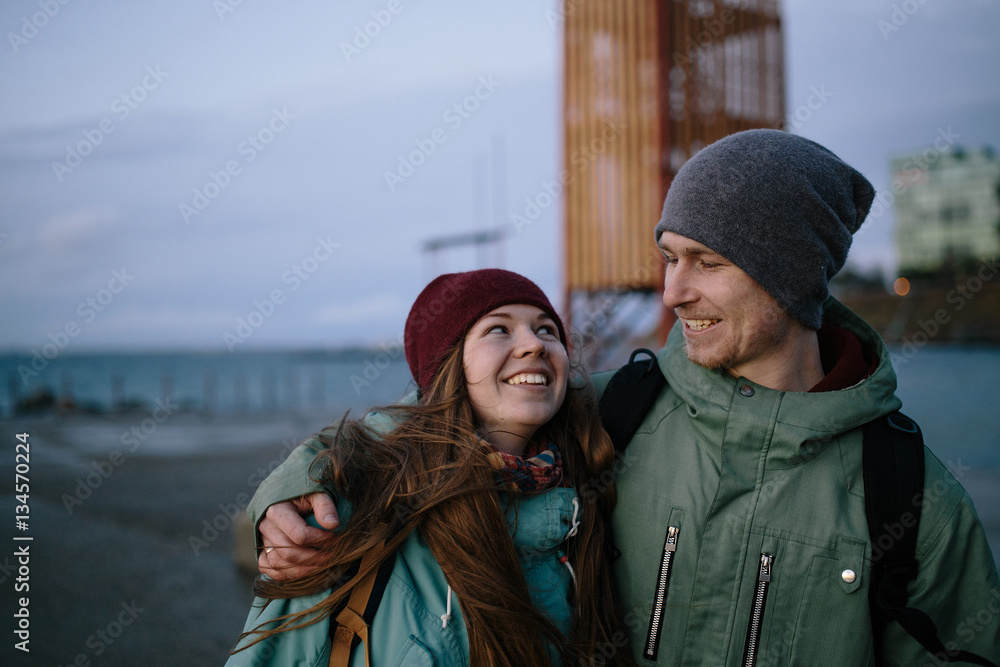 laughing young couple on the seaside laughing young couple on the seaside
