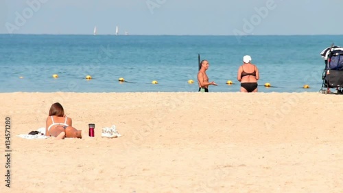 White Coffee Cup on the Wooden Beach Table
