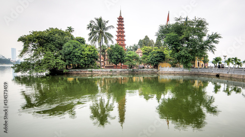 Hanoi, Vietnam - December 04, 2015: Tran Quoc pagoda in early morning in Hanoi, Vietnam. This pagoda is located on a small island near the southeastern shore of West Lake. This is the oldest Buddhist 