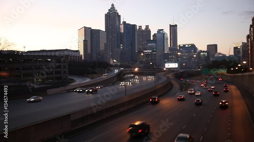 Modern cityscape with skyscrapers and highway at night, Atlanta, Georgia, USA.