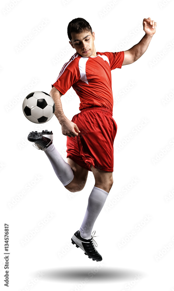 The football player in action on the white background.