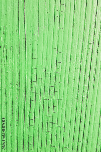 cracked wooden plank  green background