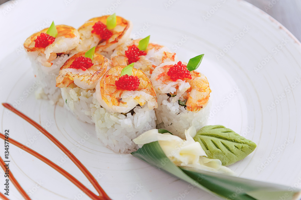 sushi on a black wooden surface sushi on a black wooden surface