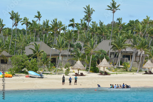Tourists arrive to resort on one of the Mamanucas islands Fiji photo