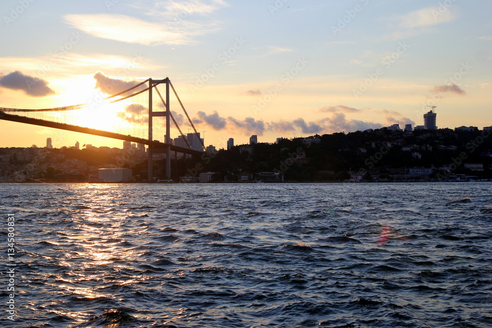 Istanbul, Turkey. The sunset on the Bosphorus with the view on the bridge.