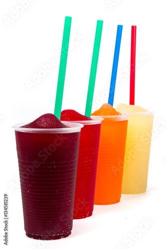 Colorful slushy, summer drink with straw