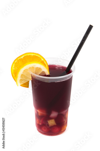 Cold drink vith fruits and straw