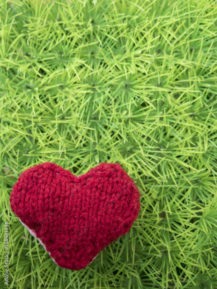 Background for Valentine s day crochet heart handmade on green g Background for Valentine s day crochet heart handmade on green g