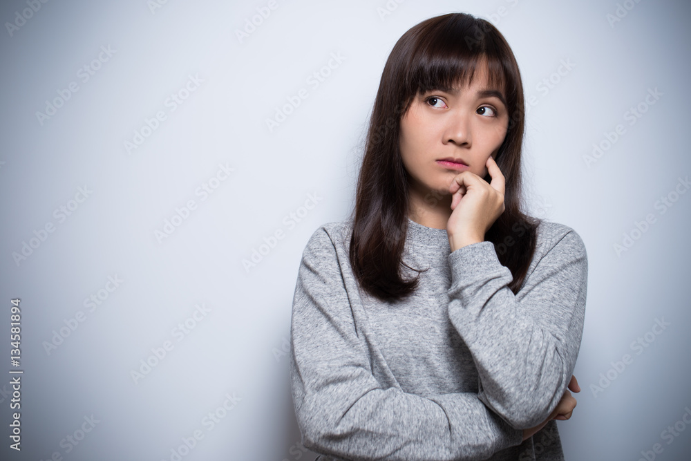 Thoughtful woman on isolated background Thoughtful woman on isolated background