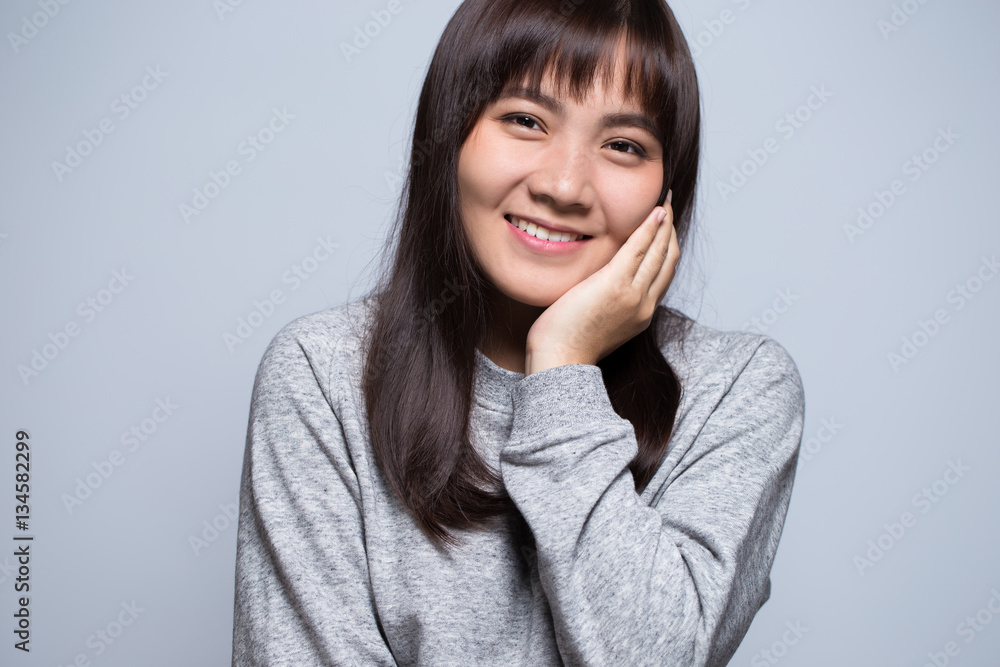 Shy woman on isolated background Shy woman on isolated background