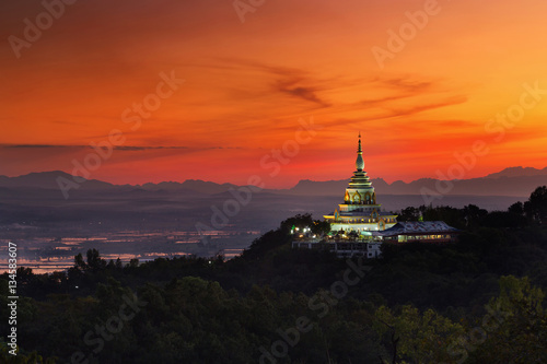 Landscape of sunset over pagoda at Wat Thaton,Chiang Mai,Thailand. © namning