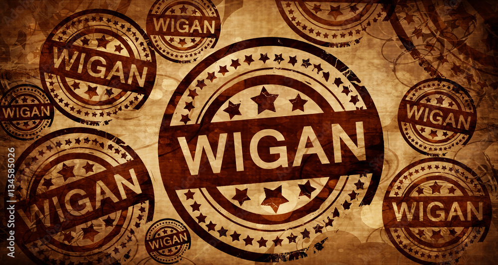 Wigan, vintage stamp on paper background