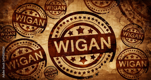 Wigan, vintage stamp on paper background
