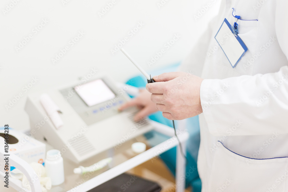 Urologist holding examination device. healthcare, technology and Urologist holding examination device. healthcare, technology and