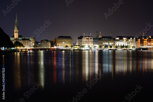 Panoramic view of Hamburg from Alster lake at night. Germany
