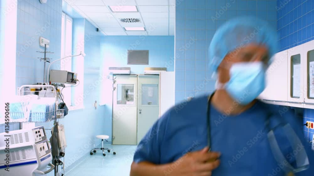 Doctor and nurse running in passageway of hospital during emergency 4k