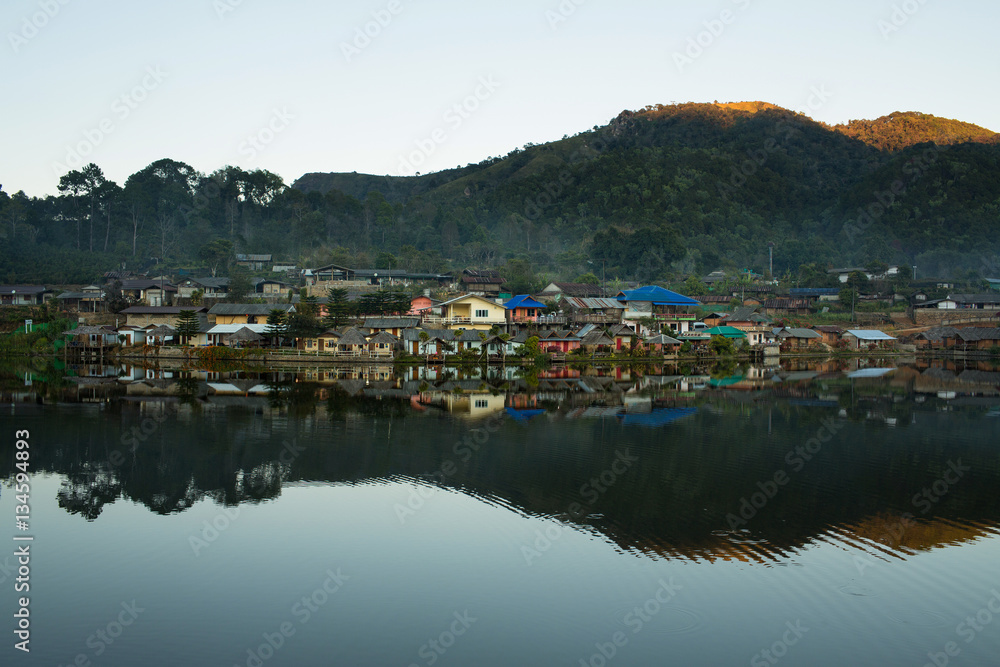Beautiful mountain village around the lake with reflection in Mae Hong Son,Thailand.