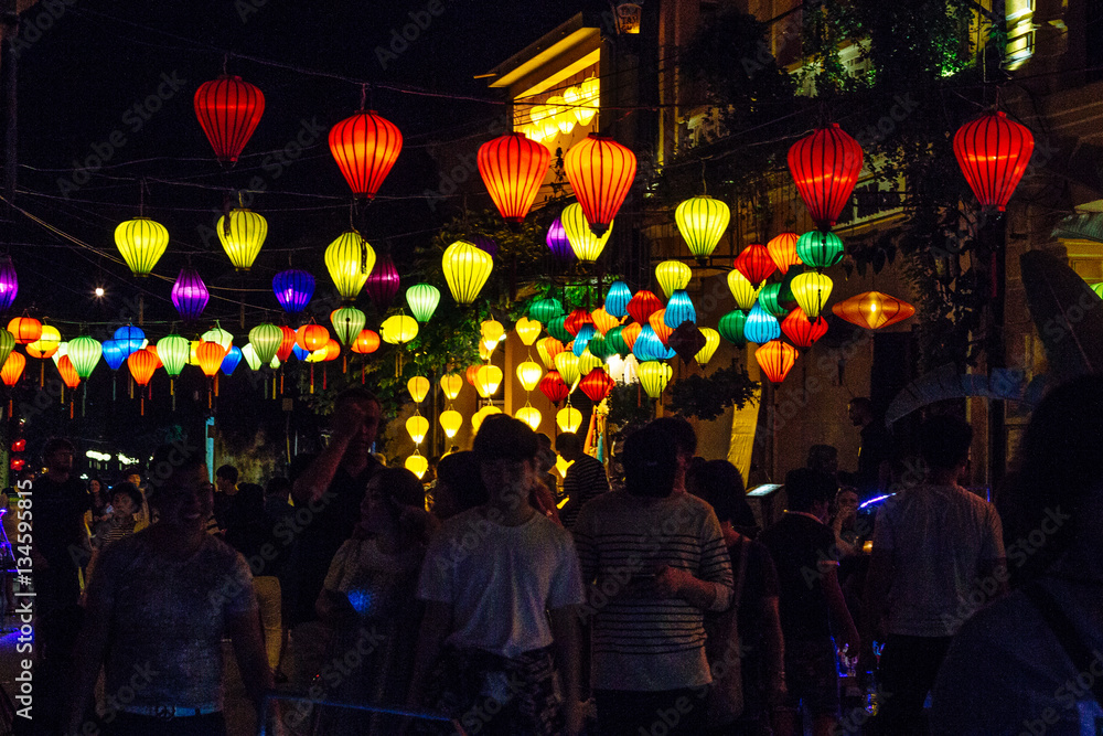 Colorful lanterns spread light on the old street of Hoi An Ancient Town - UNESCO World Heritage Site. Vietnam. Colorful lanterns spread light on the old street of Hoi An Ancient Town - UNESCO World Heritage Site. Vietnam.