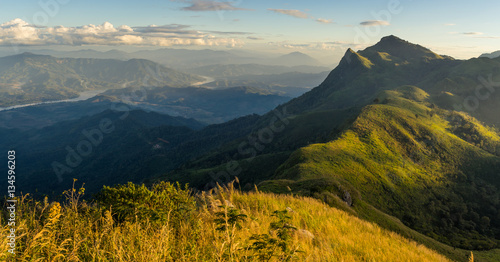 Panoramic view of Pha Tang at beautiful sunset, mountains range in Chiang Rai province, Thailand, Asia