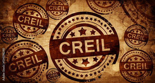 creil, vintage stamp on paper background