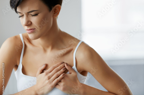 Heart Attack. Beautiful Woman Feeling Pain In Chest. Health Care