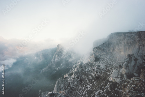 Rocky Mountains and clouds foggy Landscape Travel aerial view serene scenery wild nature