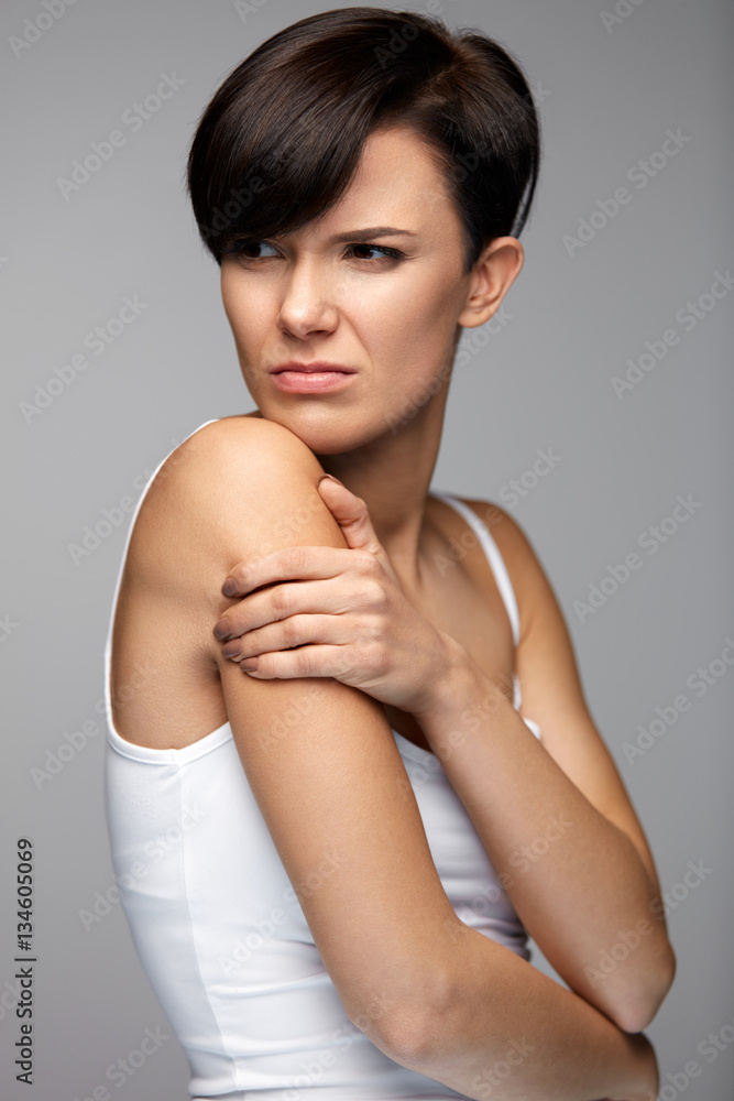 Body Pain. Beautiful Woman Feeling Pain In Shoulders And Arms Body Pain. Beautiful Woman Feeling Pain In Shoulders And Arms
