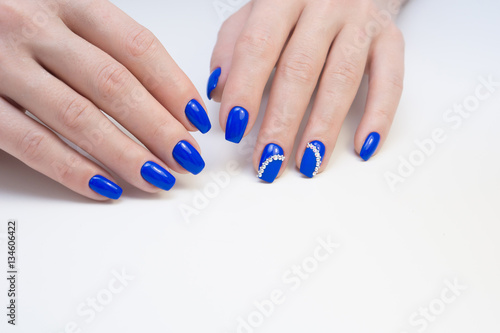 Hands and natural nails, ideal clean manicure. Decorated with stylish elements