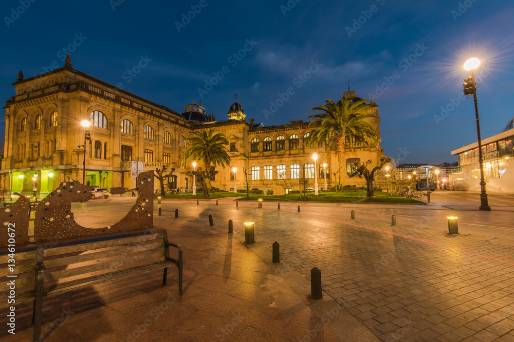 Illuminated City Hall in San Sebastian at twilight