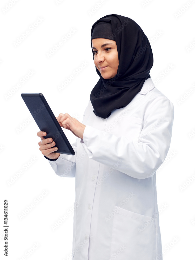 muslim female doctor in hijab with tablet pc muslim female doctor in hijab with tablet pc