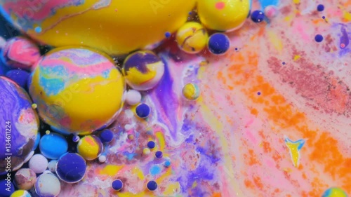 Abstract Pattern Oil Surface Moving Surface 4K Liquid Paint Moving Stream Of Ink Splashing Chemical Reaction Red Green Blue Black Purple Orange And Yellow Slow Motion photo