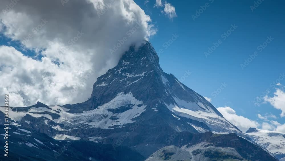 timelapse of the amazing matterhorn and surrounding mountains in the Swiss Alps with fantastic cloud formations timelapse of the amazing matterhorn and surrounding mountains in the Swiss Alps with fantastic cloud formations