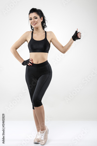 beautiful brunette woman doing various exercise fitness