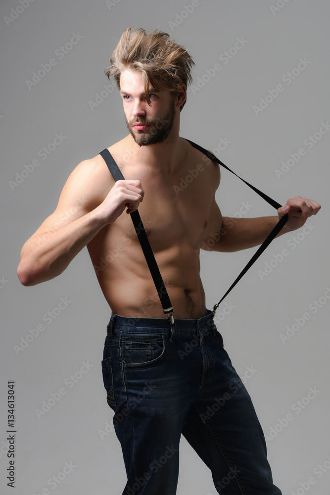 Fototapeta premium Handsome bearded man in jeans