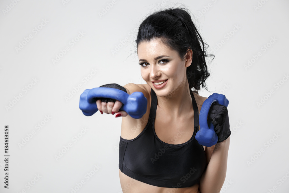 woman with dumbbells doing different exercises woman with dumbbells doing different exercises