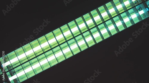 Fluorescent neon light tubes flickering when switching on and off photo