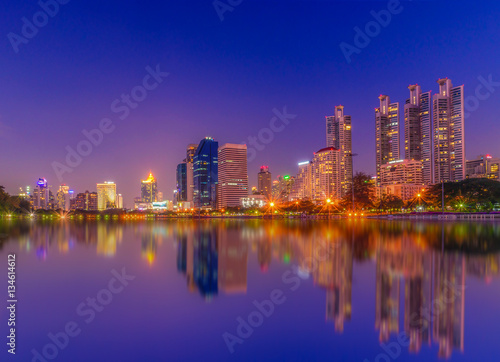 Cityscape image of Benchakitti Park at twilight time in Bangkok  Thailand.