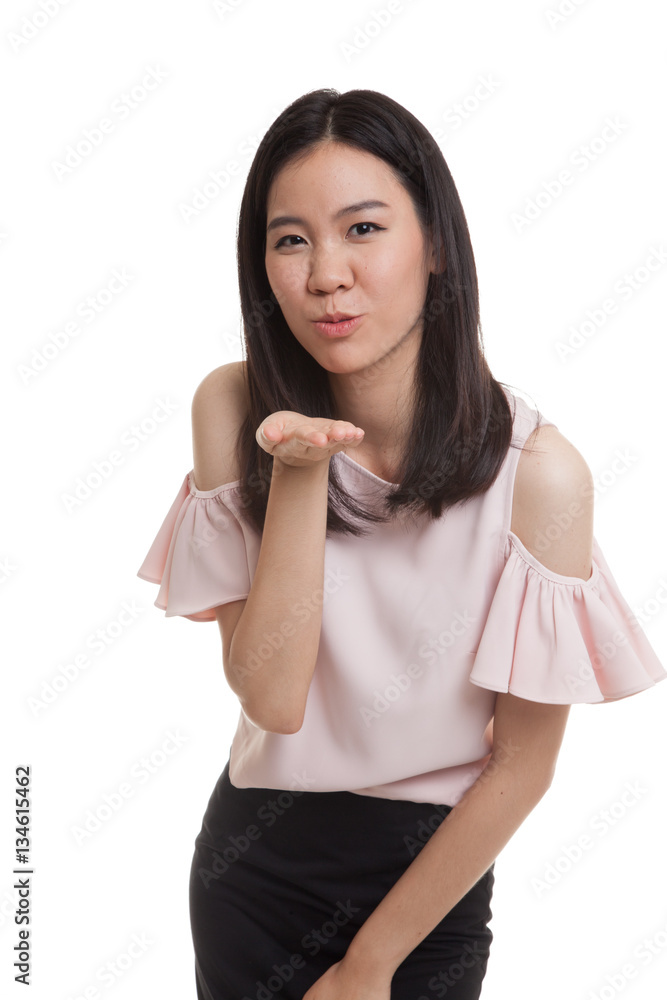 Beautiful young Asian woman blow a kiss. Beautiful young Asian woman blow a kiss.