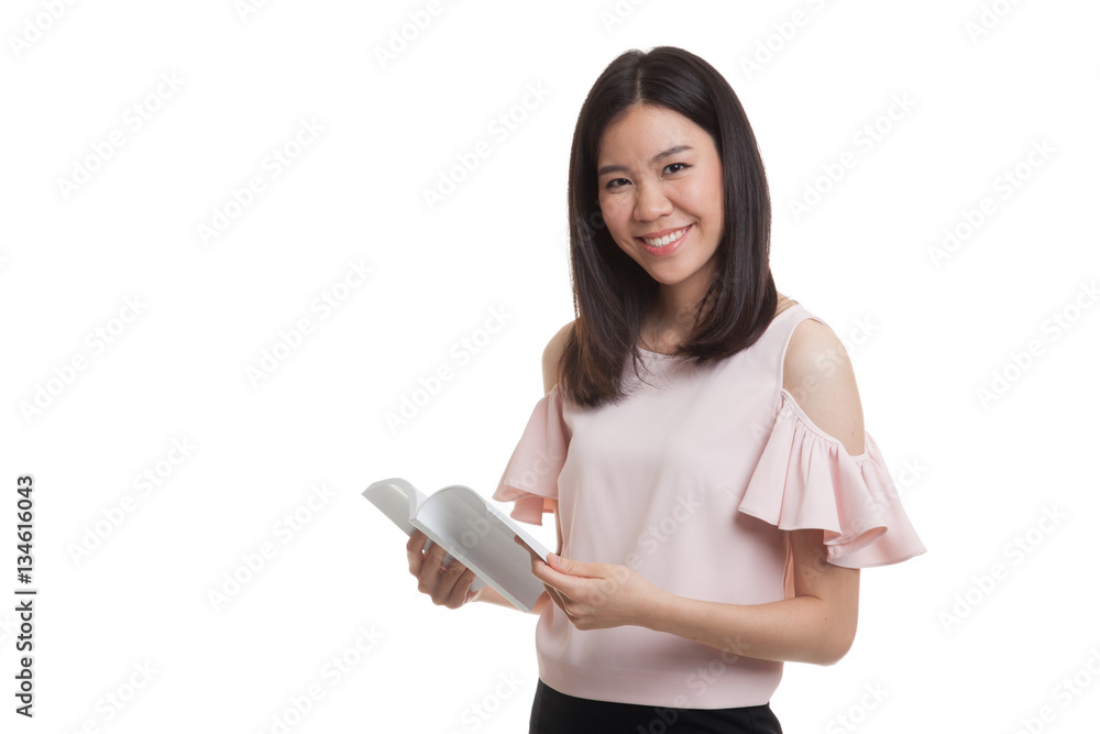 Young Asian business woman with a book. Young Asian business woman with a book.